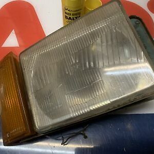 HEADLIGHT H4 RH WITH INDICATOR CARELLO 510 USED